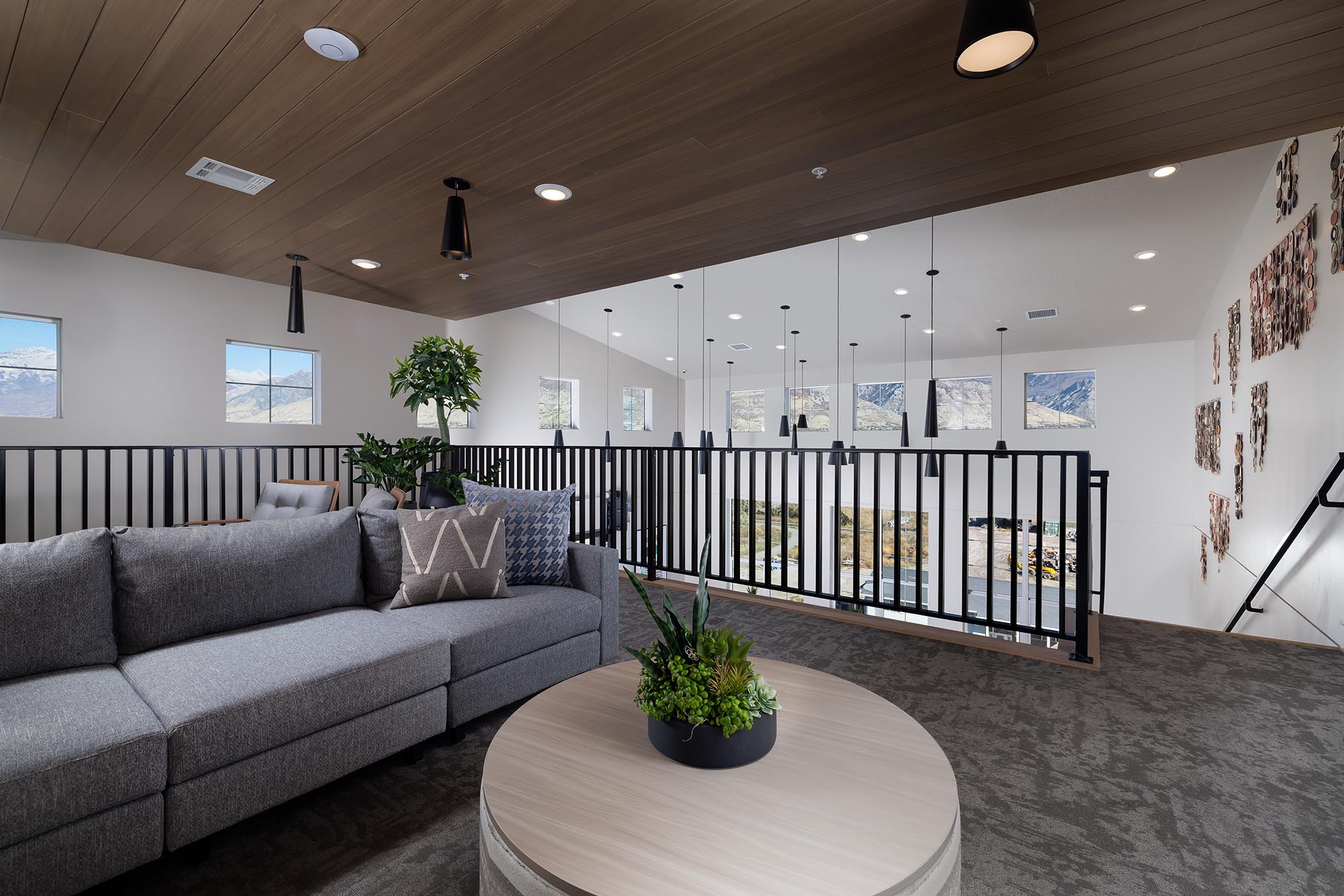 Solhavn-Apartments-Interior-Level-5-Clubroom-Mezzanine-Couch-and-Stairs