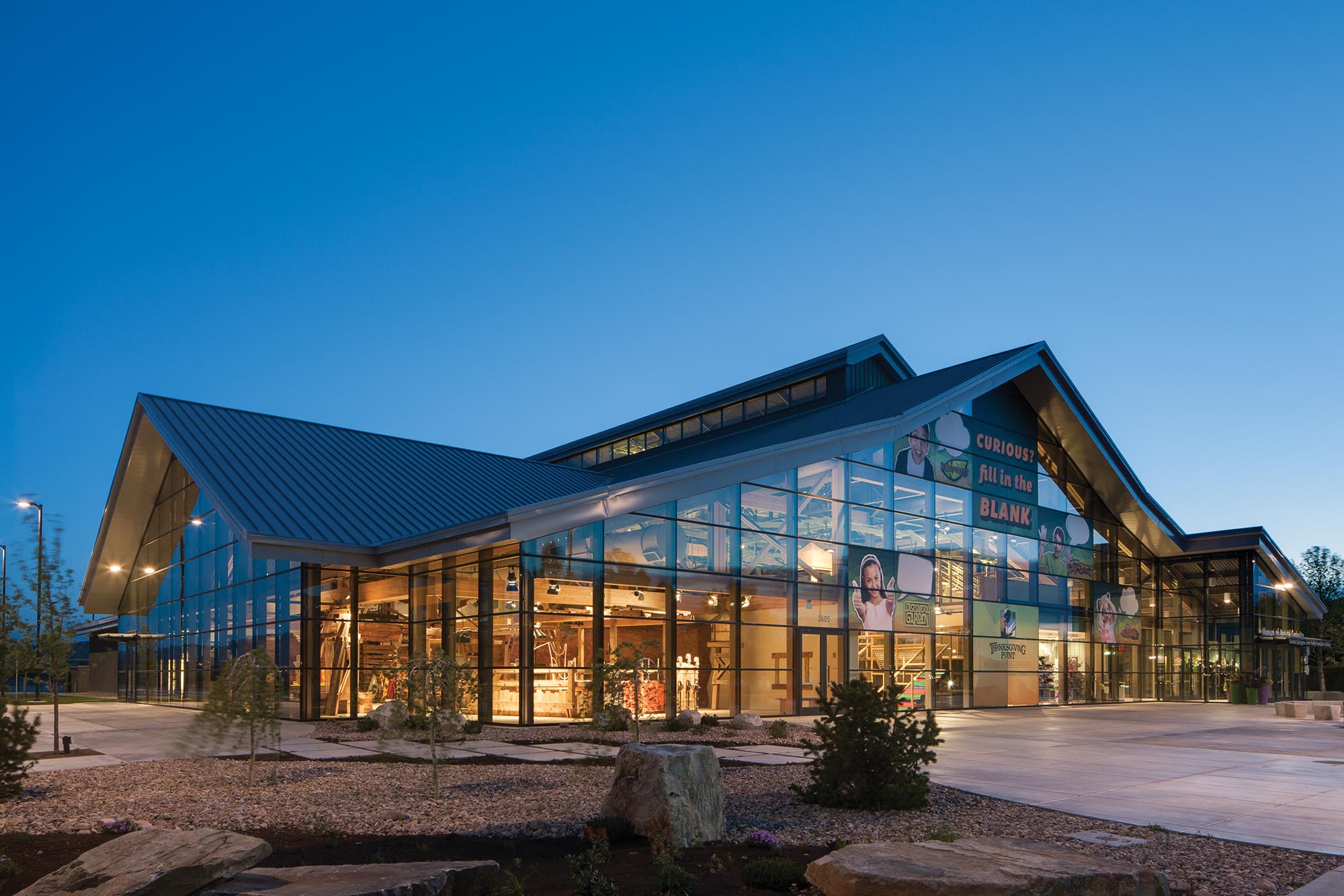 ext_MONC_entrance_Dusk N. Eldon Tanner Business Building