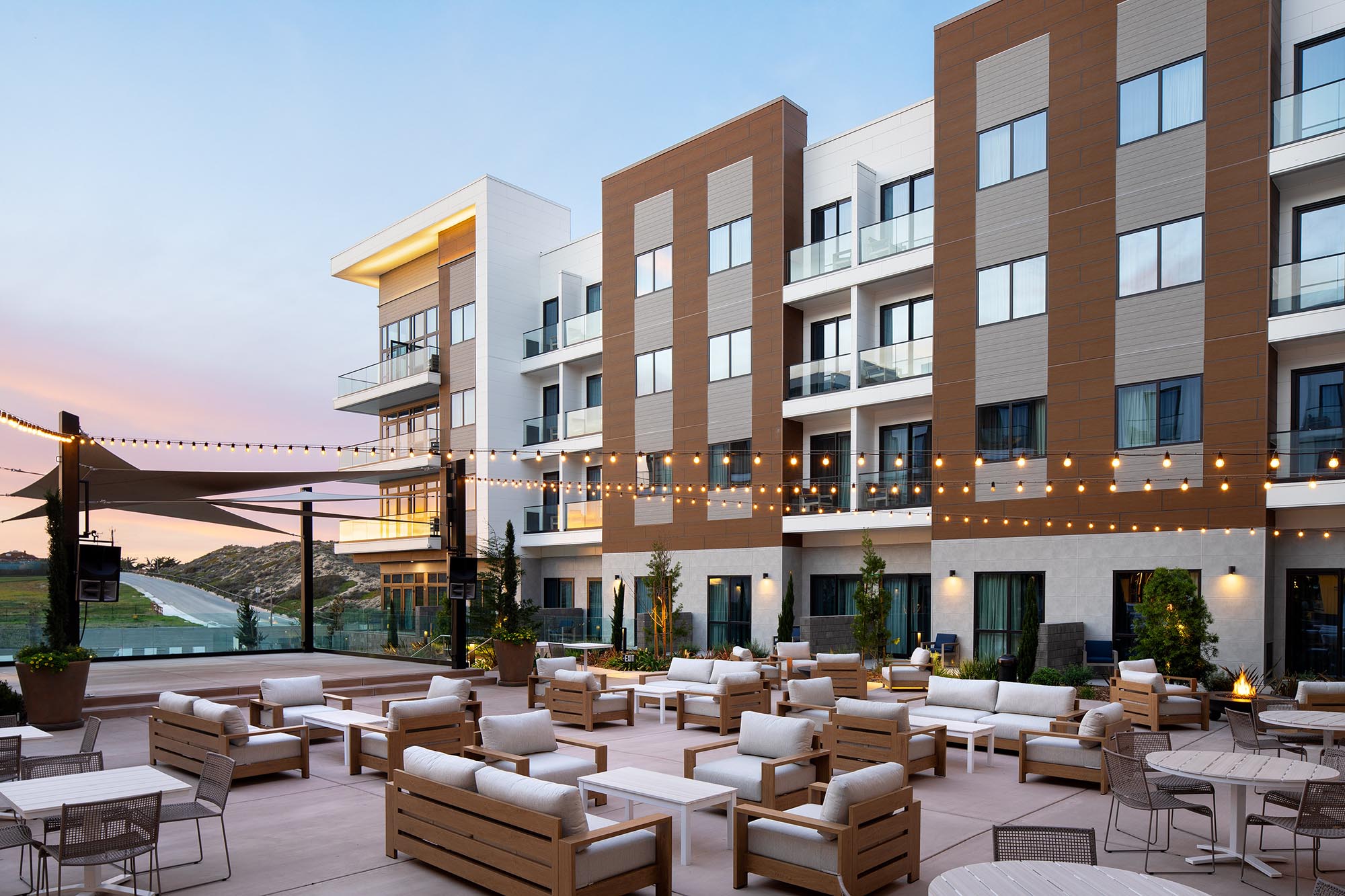 Monterey-Marriott-Courtyard-and-Residence-Inn-Exterior-Piazza-Dusk-01 N. Eldon Tanner Business Building